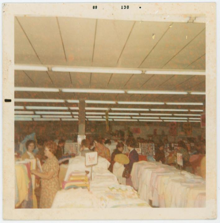 Shopper is the original Paducah Hancock's fabric store, October 1969